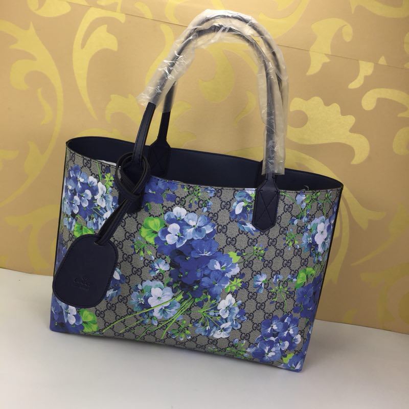 G*u*i shopping bags